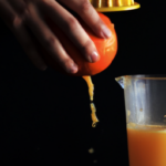 how-to-juice-an-orange-with-a-juicer.png